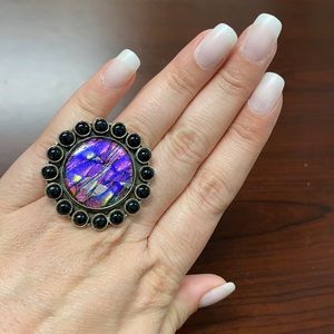 glass ring with onyx set in sterling silver. Adjustable.